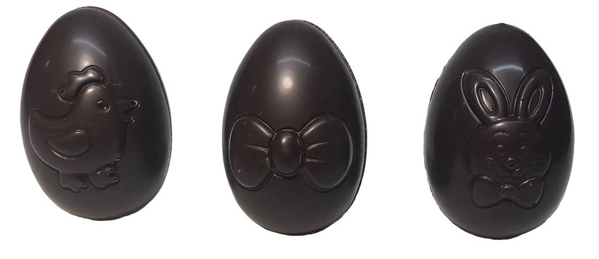 Assortment of hollow, playful eggs, dark chocolate